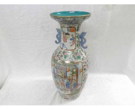 A Famille Rose Large Baluster Vase, the neck applied with animalistic handles and the body decorated with interior scenes and