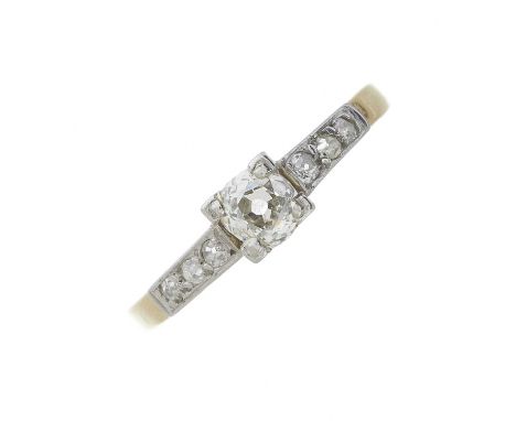 An early 20th century 18ct gold and platinum old-cut diamond single-stone ring, with similarly-cut diamond sides, principal d