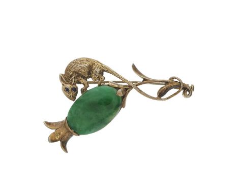 An 18ct gold jadeite brooch, modelled as a field mouse on a seed pod, with onyx eye detail, stamped 18, length 4.2cm, 5.2gOve