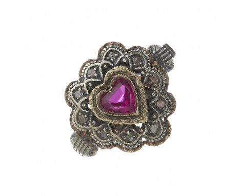 A mid 20th century gold and silver, ruby and rose-cut diamond heart-shape dress ring, Portuguese marks, ring size O, 4.5gOver