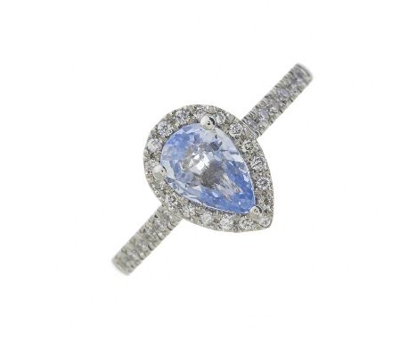 A platinum pear-shape sapphire and brilliant-cut diamond cluster ring, sapphire estimated weight 1ct, estimated total diamond