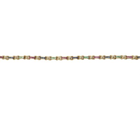 An 18ct gold, ruby, sapphire, emerald and diamond bracelet, estimated total diamond weight 0.20ct, stamepd 750, length 18.4cm