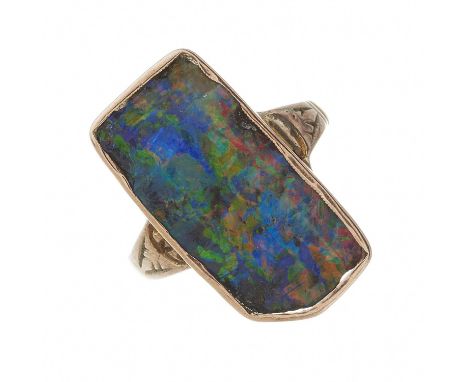 An early 20th century black opal ring, with 22ct gold replacement band, opal measures approximately 19.5mm by 9.7mm, band wit