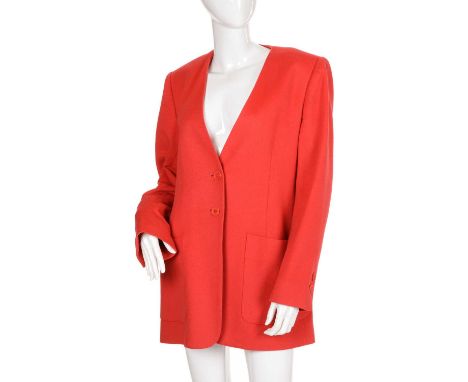Hermes, a 1980s red cashmere jacket, featuring a V-neck, front button fastenings, two exterior patch pockets, and red jacquar