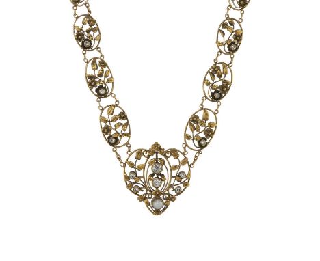 Edward Everett Oakes (attributed), an impressive American Arts &amp; Crafts gold, old-cut diamond and split pearl floral open