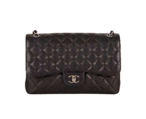 Chanel, a Jumbo Classic Double Flap handbag, featuring a black caviar quilted leather exterior, with polished silver-tone har