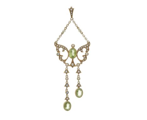 An Edwardian gold peridot and split pearl openwork pendant, with split pearl surmount and seed pearl accent chain spacer, len