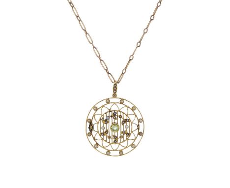 An Edwardian 15ct gold peridot and pearl pendant, suspended from a chain of similar age, stamped 15c, length of pendant 4.5cm