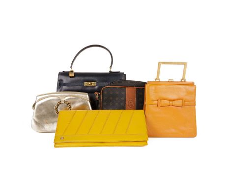 A selection of vintage handbags, to include an unbranded Kelly-style navy blue leather handbag, an oversized yellow clutch ba