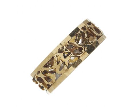An 18ct gold openwork band ring, hallmarks for Birmingham, ring size N1/2, 5.6gOverall good conditionWidth of band 6.7mmLight