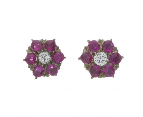 A pair of early 20th century gold ruby and brilliant-cut diamond cluster stud earrings, estimated total diamond weight 0.20ct