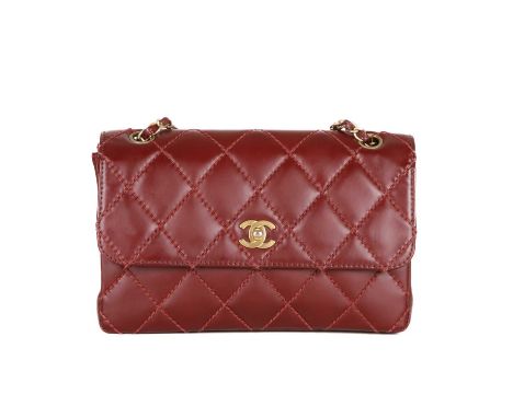 Chanel, a burgundy Wild Stitch Single Flap handbag, featuring the maker's signature wild stitch diamond quilted exterior with