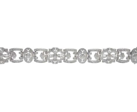 An 18ct gold vari-cut diamond openwork bracelet, estimated total diamond weight 8.50ct, G-H colour, VS clarity, French assay 