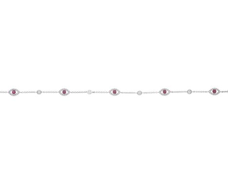 An 18ct gold ruby and diamond line bracelet, estimated total ruby weight 0.50ct, estimated total diamond weight 0.50ct, H-I c