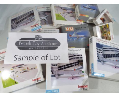 Herpa - two 1:500 scale Herpa miniature model road sets Nos 1 and 2, ten further Herpa Wing 1:500 scale model aeroplanes, a q