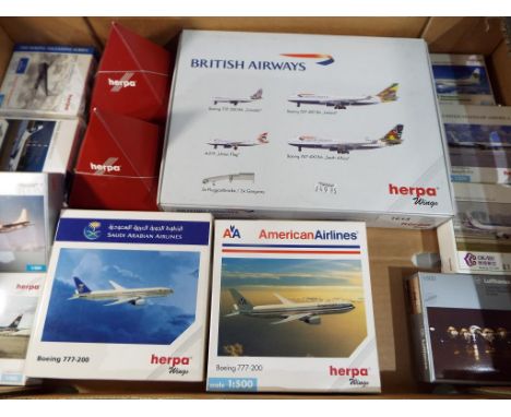 Herpa - a quantity of diecast model airplanes by Herpa 1:500 scale to include a collection pack, pyramid displays and similar