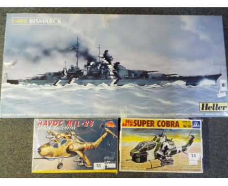 Model Kits - a 1:400 scale model kit by Heller of the Bismarck in original box with instructions, an Italeri 1:72 scale of a 