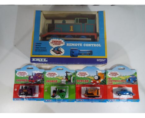 Thomas the Tank Engine - five Thomas the Tank Engine and Friends models by Ertl to include a remote controlled Thomas in orig