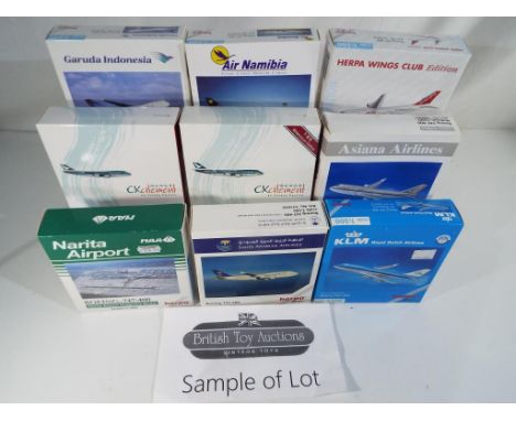 Model Aeroplanes - Fifteen diecast models of commercial airliners by Herpa, all in 1:500 scale. All models appear mint in ori