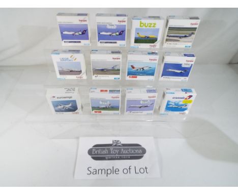 Model Aeroplanes - Thirty diecast models of commercial airliners by Herpa, all in 1:500 scale. All models appear mint in orig