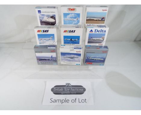 Model Aeroplanes - Thirty diecast models of commercial airliners by Herpa, all in 1:500 scale. All models appear mint in orig