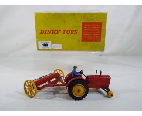 Dinky Toys - good quality boxed Dinky toys No.310 Farm Tractor and Hay Rake, red body, yellow hubs, blue driver (front tyres 