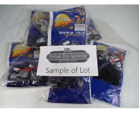 Approximately twenty two 1:18 scale diecast models by Mega Bikes in protective wrapping.