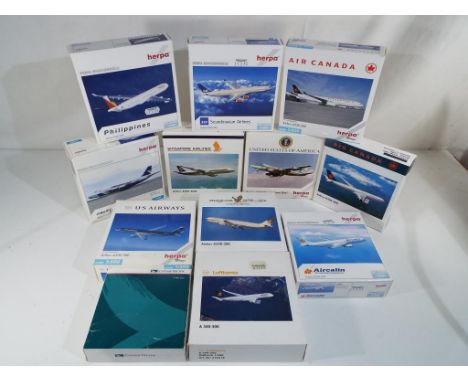 Herpa - twelve diecast model airplanes 1:500 scale predominantly made by Herpa Wings, all appear mint in box
