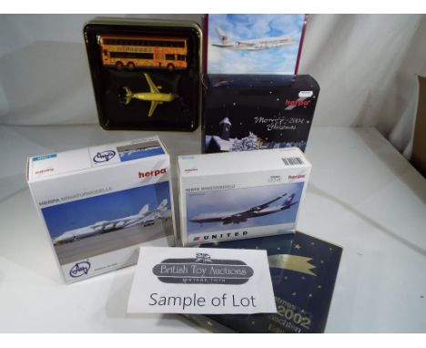 Model Aeroplanes - Ten diecast model plane sets by Herpa, all in 1:500 scale, comprising Christmas sets, Singapore Airlines a