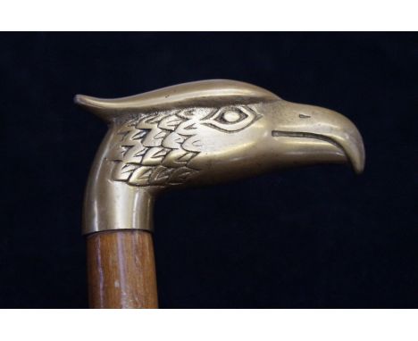 Walking stick with brass eagles head 