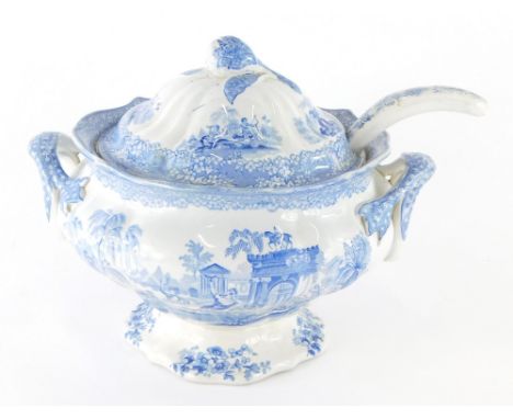 A 19thC J &amp; M P Bell pottery blue and white soup tureen, with ladle, Glasgow design, printed marks beneath, 31cm high.