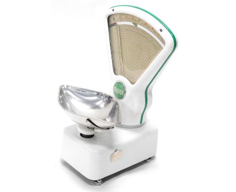A set of Avery shop scales, decorated in white and green enamel, 50cm high. 