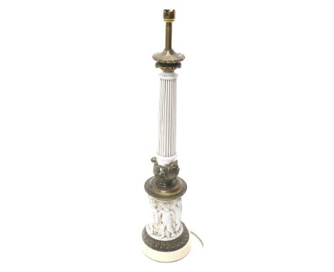 A continental composition and brass column table lamp, decorated with putti, 72cm high. (AF)