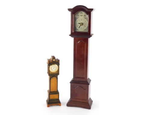 A 20thC miniature longcase clock, in mahogany finish case, Tempus Fugit type, 40cm high, and another smaller. (2)