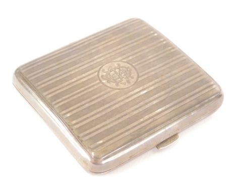 A George V silver cigarette case, with engine turned decoration and an initialled cartouche, Birmingham 1925, 9cm high, 3oz a