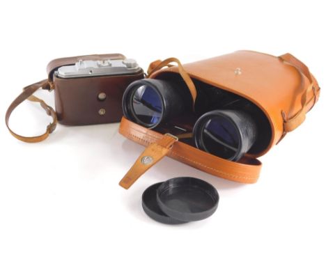 A Foitzik Trier camera, Foinix 6X6, a pair of binoculars, a pair of Green Cat field binoculars, 12x16, leather case.