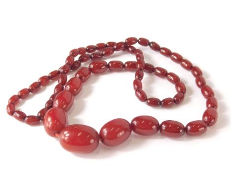 A faux ruby amber finish necklace, with graduated beads, 80cm long. 