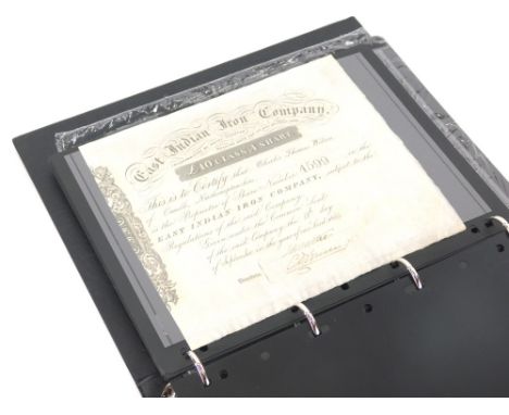 An album containing various vintage share certificates, etc., to include Manchester Carriage Company Ltd, Charles Laffitte an