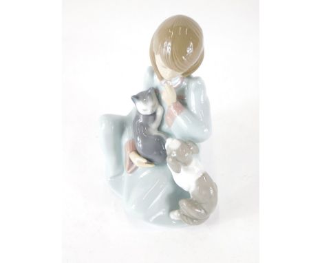 A Lladro lady figure, Cat Nap, 05640, 19cm high (boxed).
