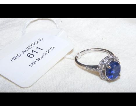 A 14ct gold blue stone and diamond set ring 