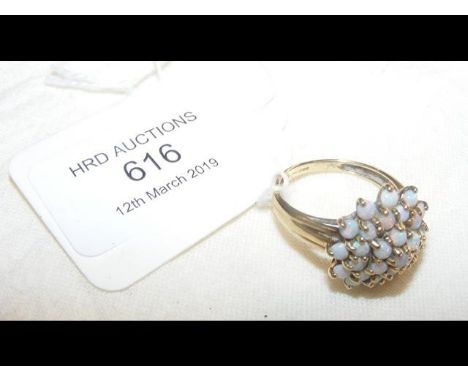 A gold and opal cluster ring 