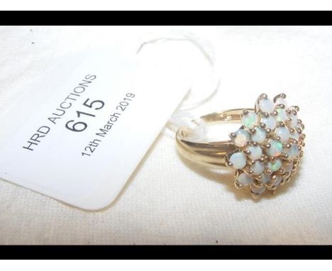 A gold and opal cluster ring 