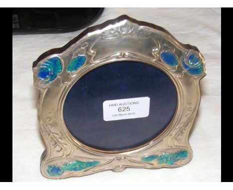 A silver and enamel photo frame - 15.5cm high 
