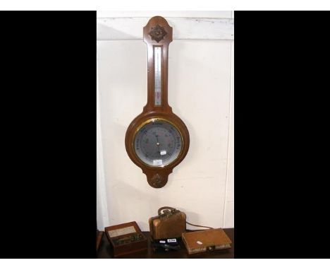 A barometer/thermometer, together with a small handbag, opera glasses, etc. 