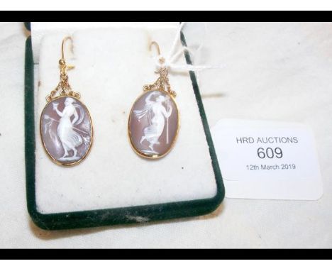 A pair of antique drop Cameo earrings set in gold 