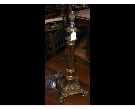 A decorative antique brass table lamp - 55cm high 