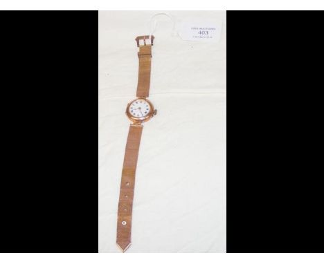 A lady's 9ct gold wrist watch with 9ct gold strap in presentation case CONDITION REPORTTicking order with good dial; 9ct mark
