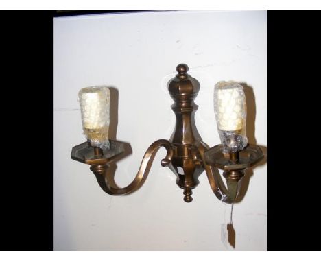 A cast bronzed two branch wall light 