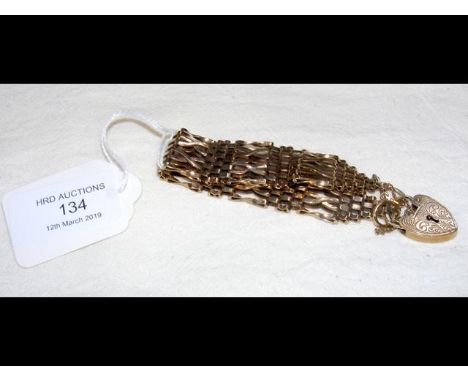 A 9ct gold four-bar gate bracelet - 25g 