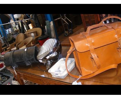 A vintage chrome car light, together with leather motorbike satchels, old keys 
